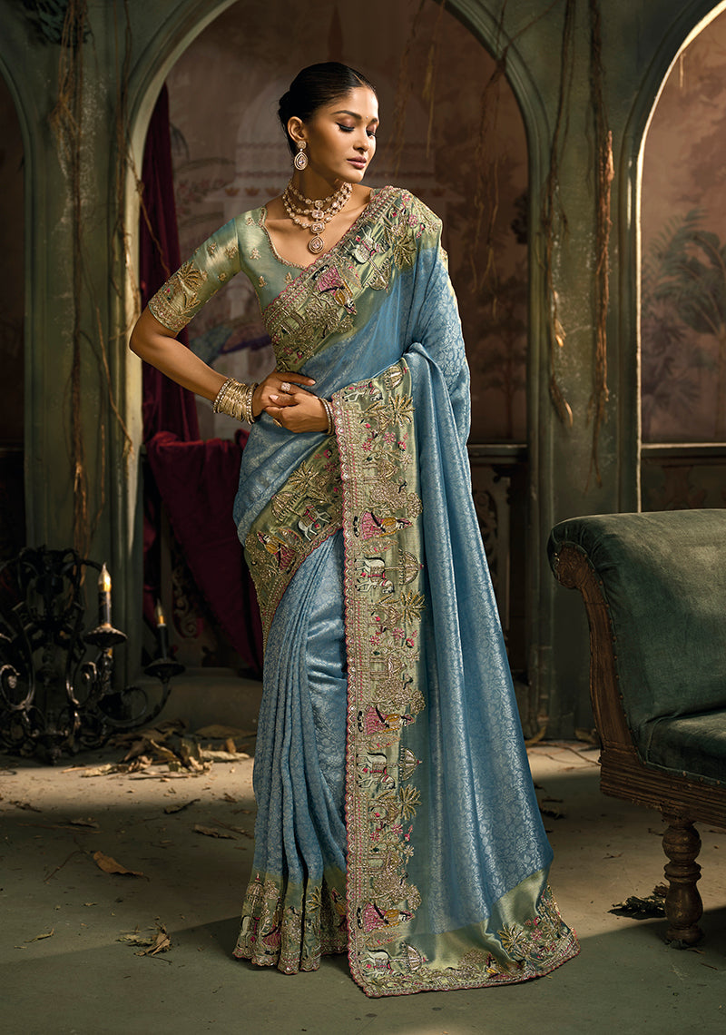 Light blue silk blend wedding saree with elegant pearl, cut-dana, and gold zari embroidery