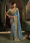 Light blue silk blend wedding saree with elegant pearl, cut-dana, and gold zari embroidery