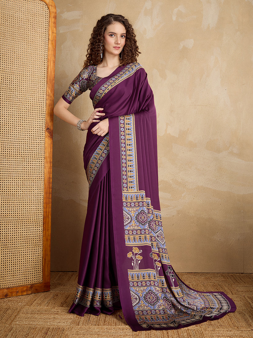 Purple satin saree with a multi-colored printed pallu and border detail.