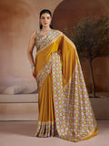Mustard and black printed satin saree with a luxurious sheen and contrast pallu