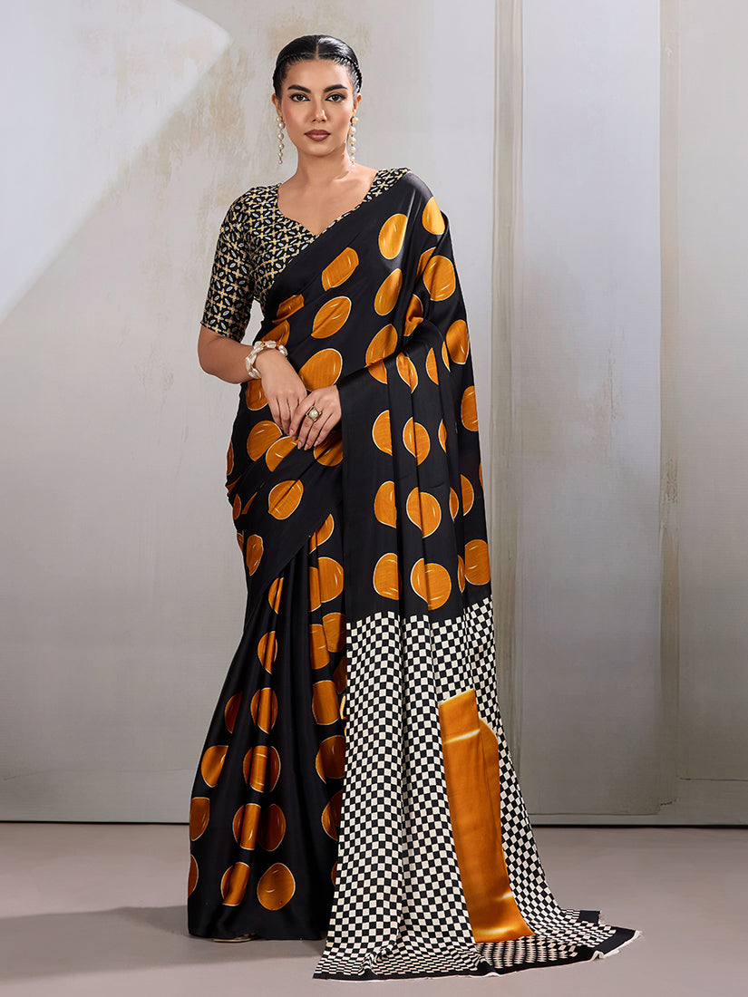 Black and orange satin saree with intricate Ajrakh hand block print