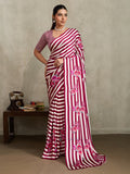 Maroon modal satin saree featuring floral prints and stylish stripe detailing