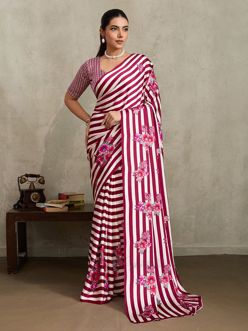 Maroon modal satin saree featuring floral prints and stylish stripe detailing