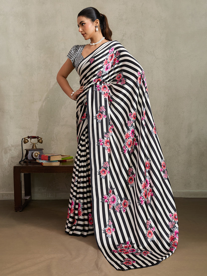 Black modal satin saree with decorative stripes and floral prints