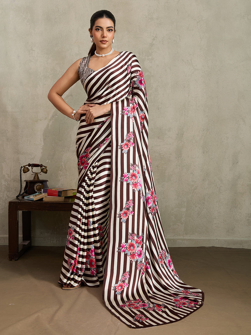 Brown modal satin saree with floral and stripe patterns.