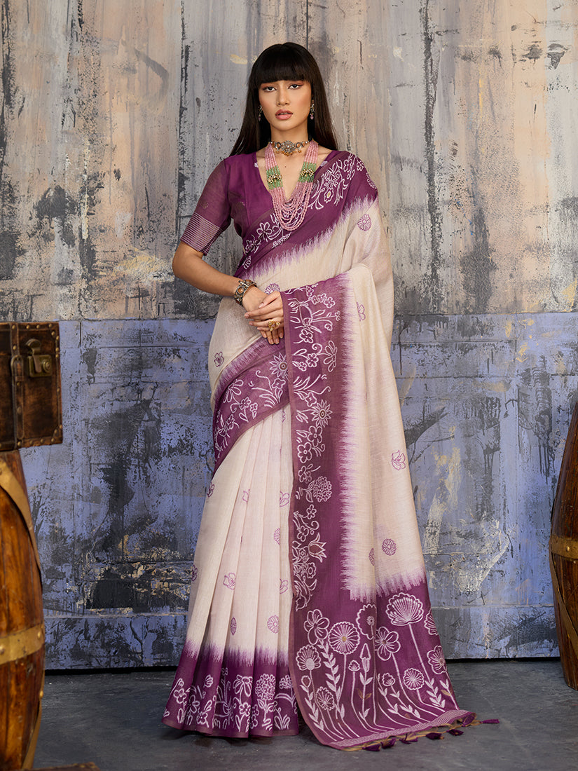 Elegant cream and plum cotton blend saree with ethnic weaving patterns