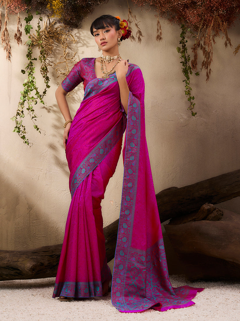 Rani pink woven Kanjivaram silk blend saree with traditional patterns