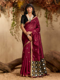 Rich maroon Tussar silk blend saree with intricate woven details.