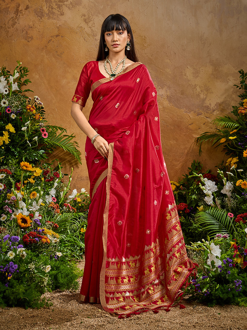Model wearing a vibrant red Tussar silk blend woven saree with traditional border details.
