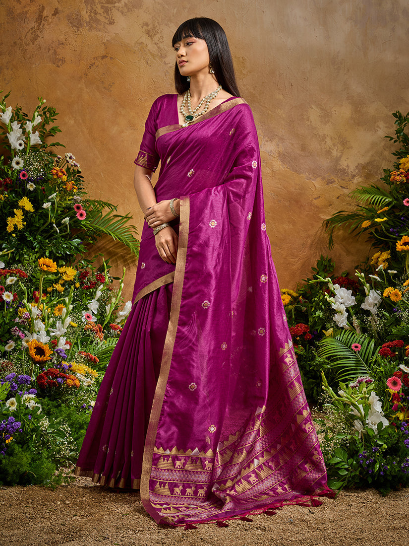 Dark magenta tussar silk blend woven saree with matching blouse draped elegantly