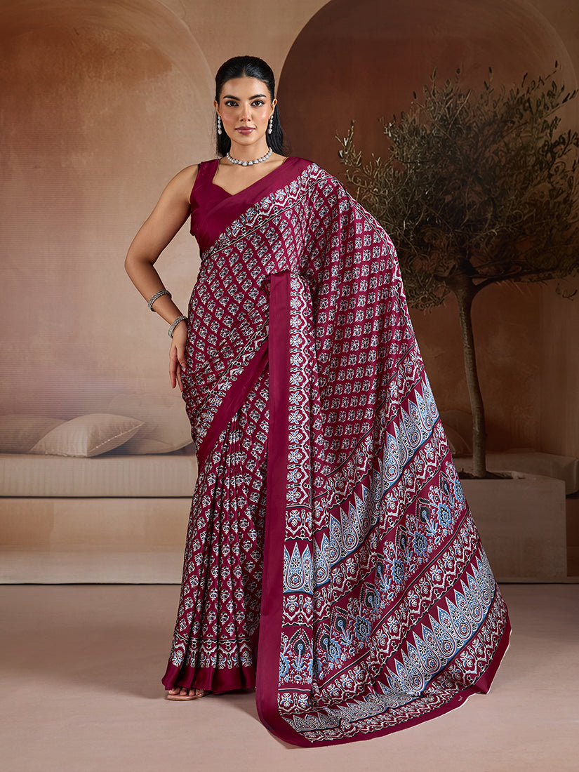 Maroon satin saree with Ajrakh hand block geometric prints and plain border.