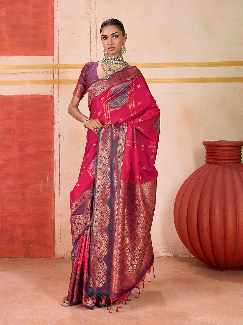 Rani pink silk blend traditional saree with intricate woven detailing