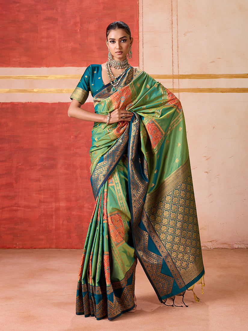 Elegant green silk blend saree with intricate woven traditional patterns