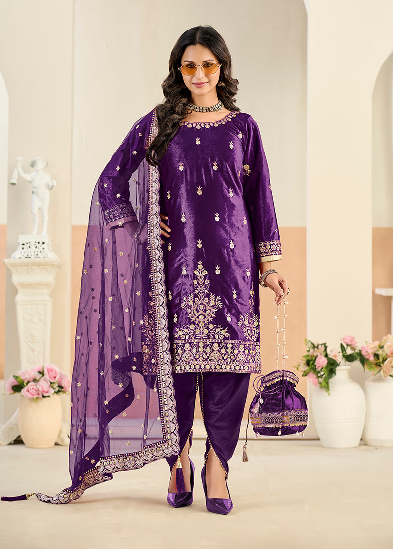 Luxurious purple velvet salwar kameez with intricate embroidery and sequins work