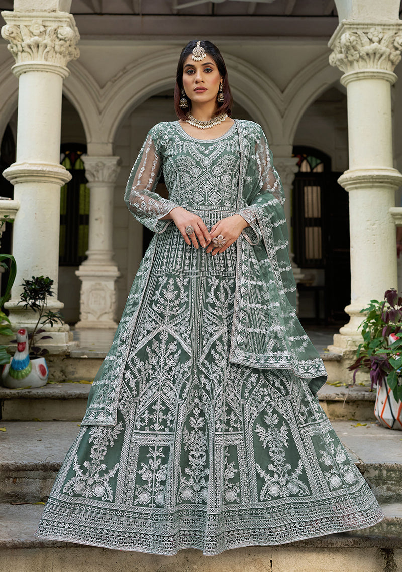 Monjolika Fashion Sea Green Embroidered Net Gown with matching dupatta worn by a model