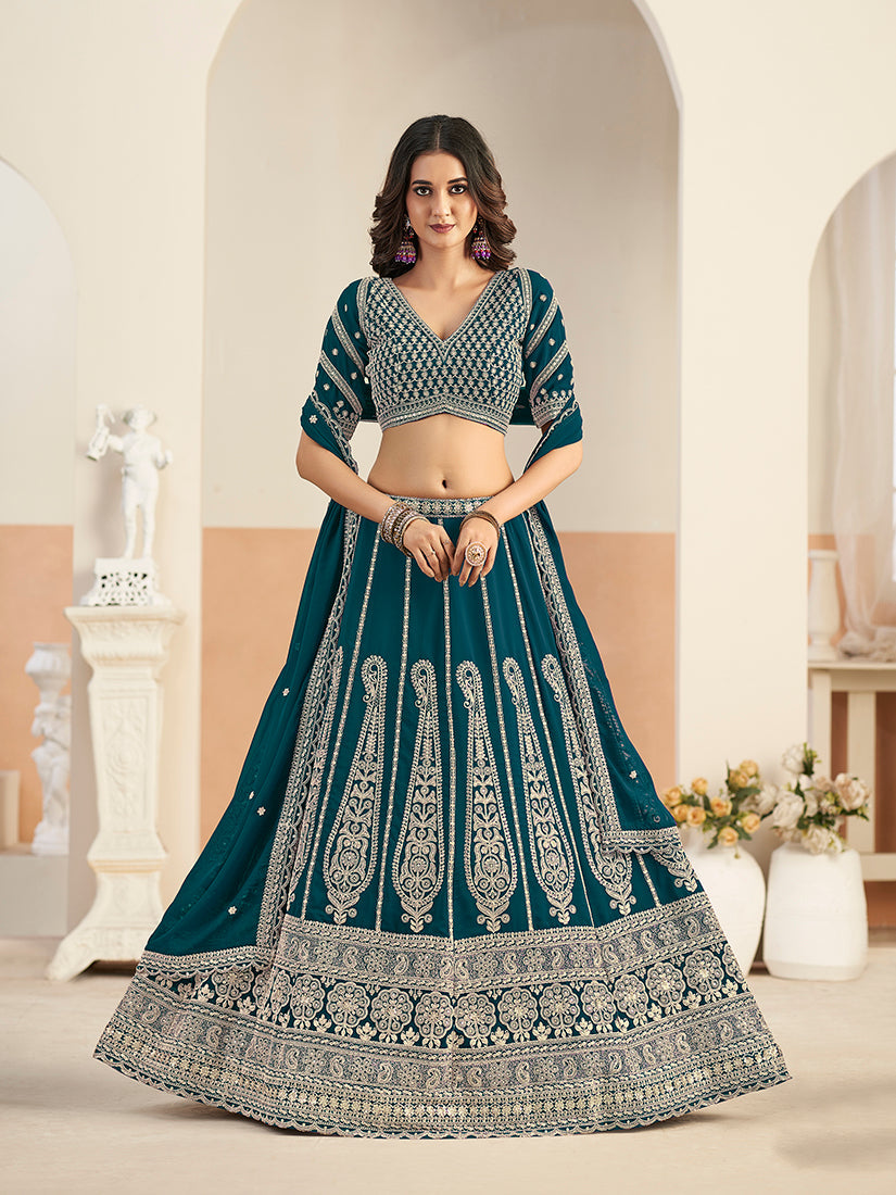 Teal blue faux georgette lehenga choli with ornate embroidery and sequin embellishments.