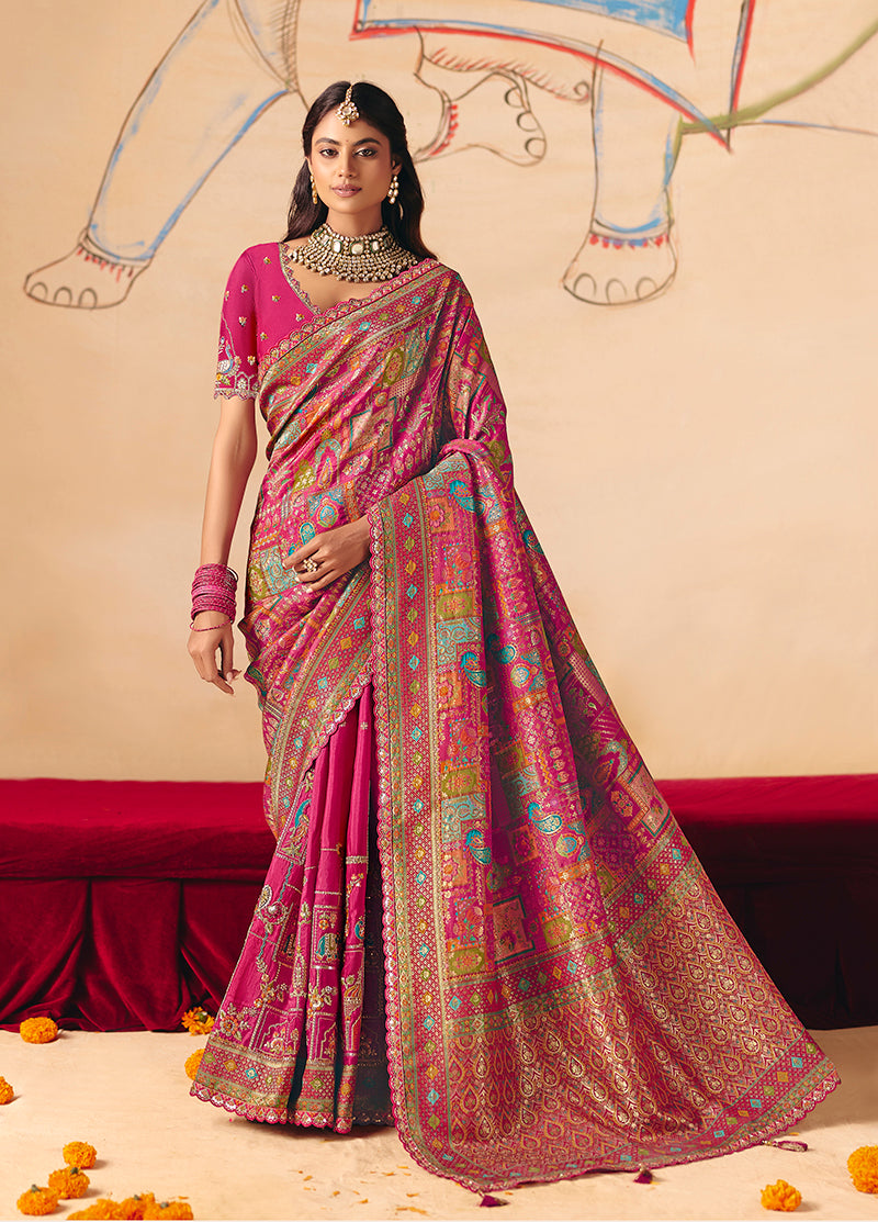 Traditional Rani Pink silk blend saree with detailed cutwork embroidery and a delicate lace border.