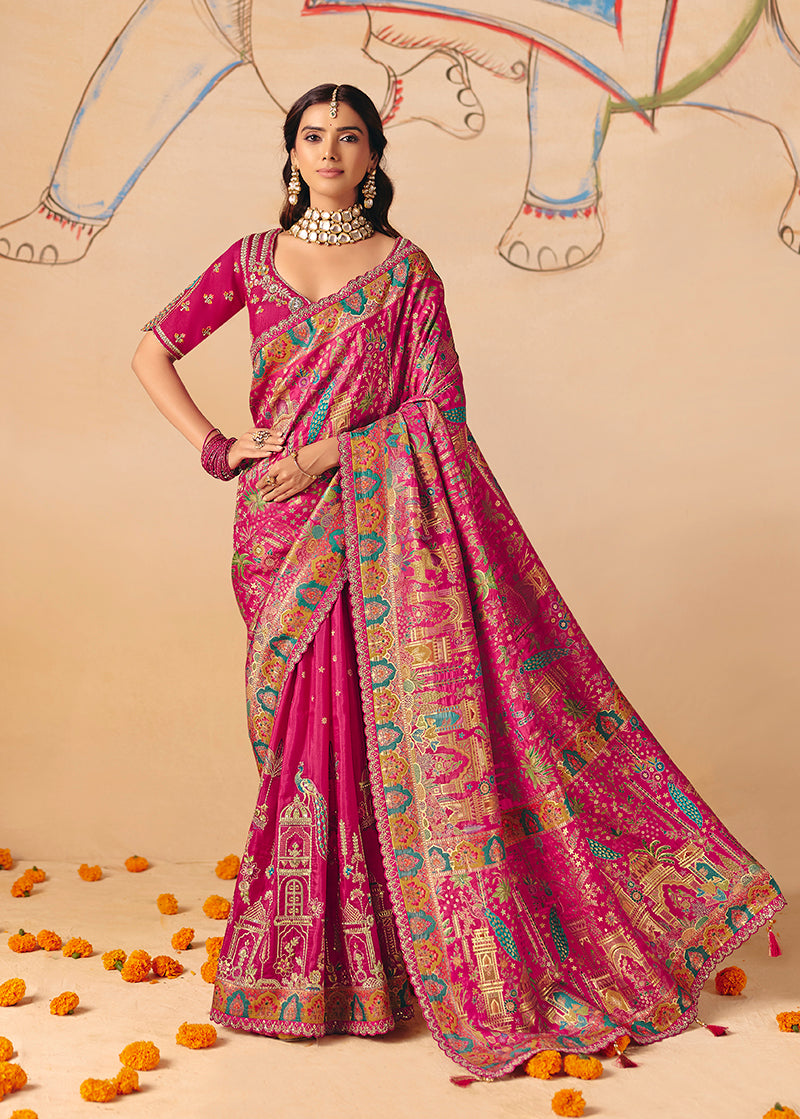 Rani pink silk blend saree featuring intricate embroidery, cutwork, and lace detailing with matching blouse.