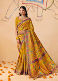 Mustard silk blend traditional saree with detailed lace, embroidery, and cutwork