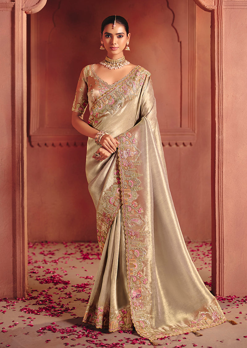 Close up of beige silk blend saree with sequin and thread embroidery