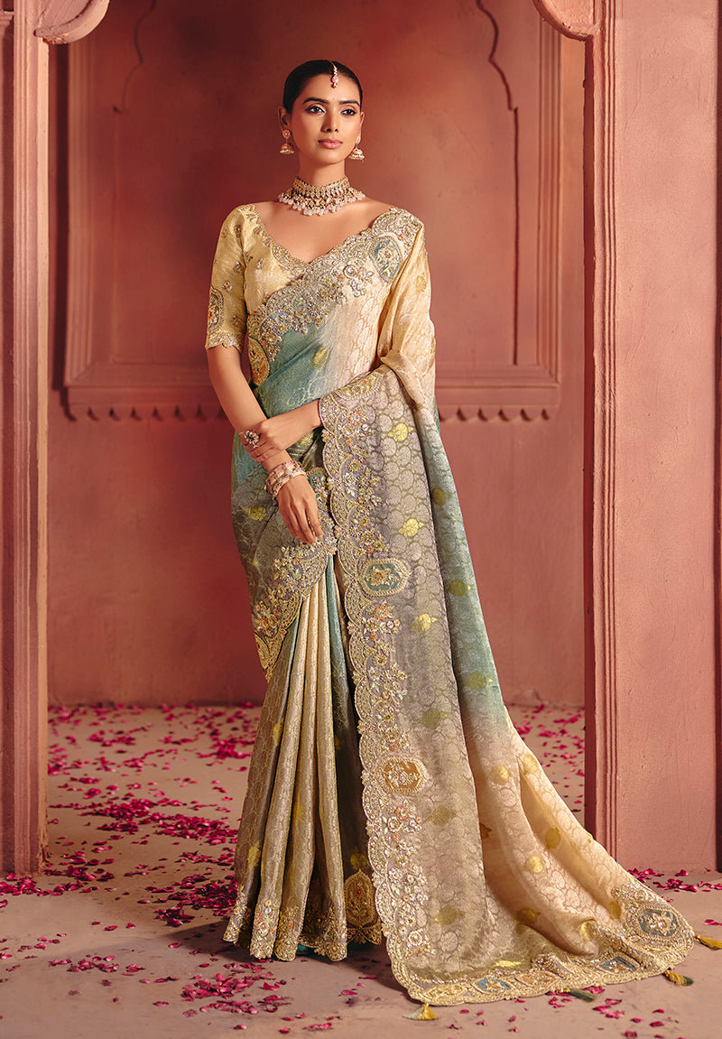 Multicolor jacquard wedding saree with intricate embroidery and sequin work including an unstitched blouse piece