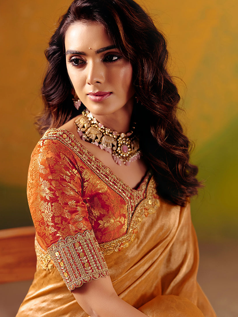 Peach silk blend saree with synchronized sequin and thread embroidery