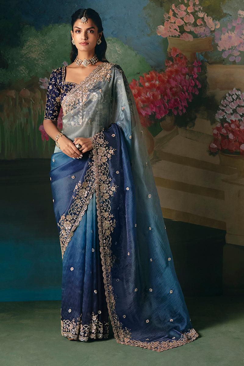 Blue fancy fabric saree with intricate embroidery, beadwork, and sequins for women