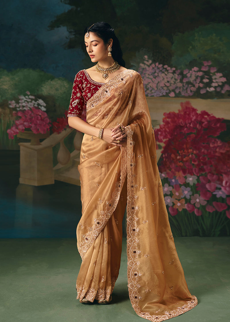 Peach fancy fabric saree with embroidery and sequin work