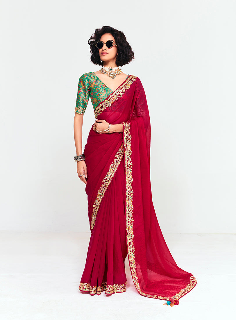 Crimson red fancy fabric saree with embroidery and sequin details
