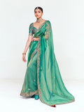 Sea Green fancy fabric saree with embroidered border and sequin detailing