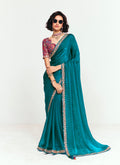 Teal fancy fabric saree featuring elegant sequins and thread work embroidery