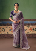 Lilac fancy fabric saree with intricate embroidery for festive occasions