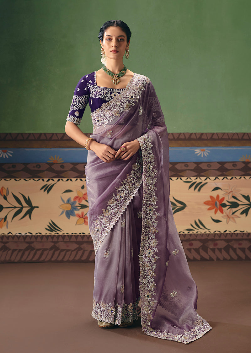 Lilac fancy fabric saree with intricate embroidery for festive occasions