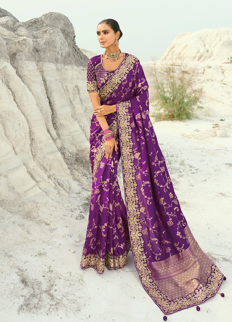 Dark magenta viscose saree featuring intricate cutdana, embroidered, and moti work with a matching blouse.