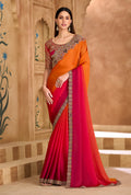 Orange and Rani Pink dual-tone faux chiffon satin saree with embroidery.