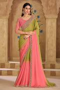 Parrot green and pink faux georgette saree with ethnic embroidered border.