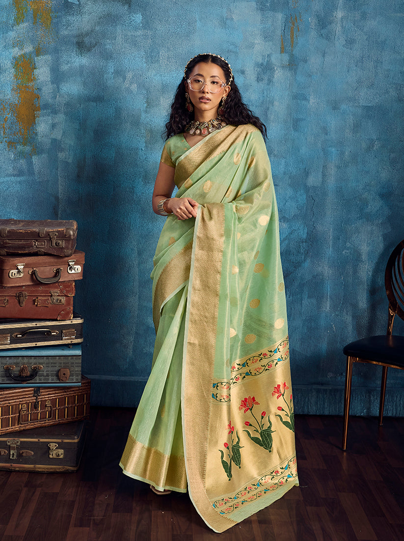 Pastel green Paithani tissue handloom saree with zari border
