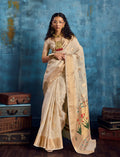 Off White Paithani tissue handloom saree featuring intricate gold zari border work.