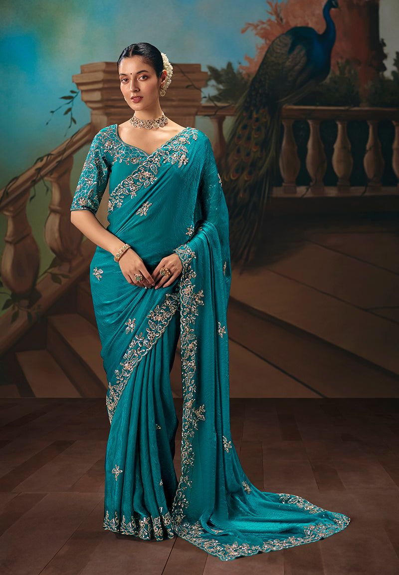 Aqua blue fancy fabric saree with embroidery work