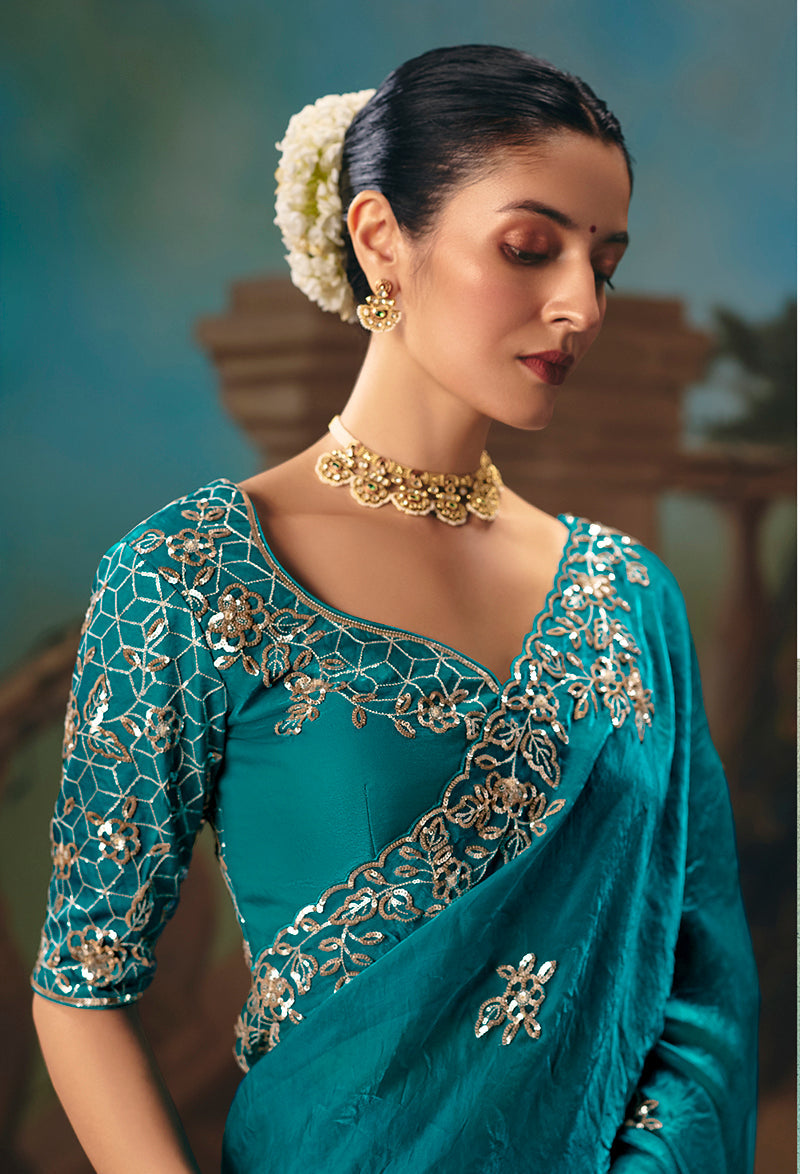Aqua Blue Fancy Fabric Saree With Exquisite Embroidery Work