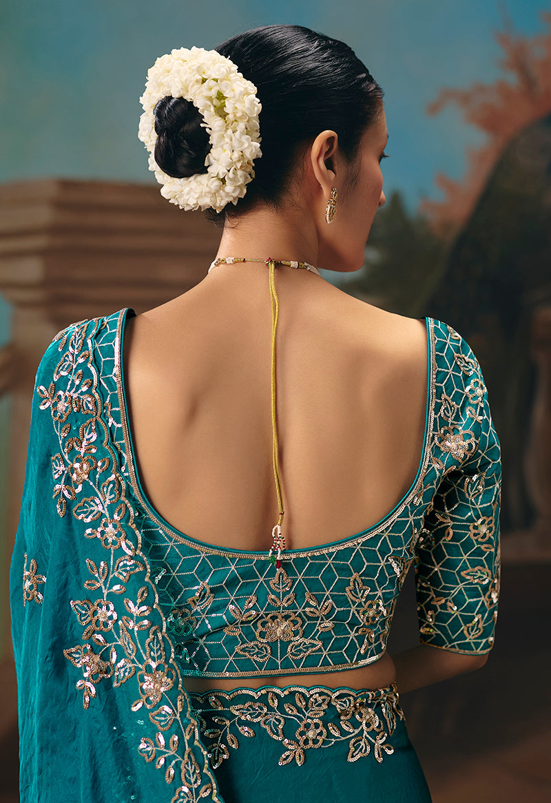 Aqua Blue Fancy Fabric Saree With Exquisite Embroidery Work