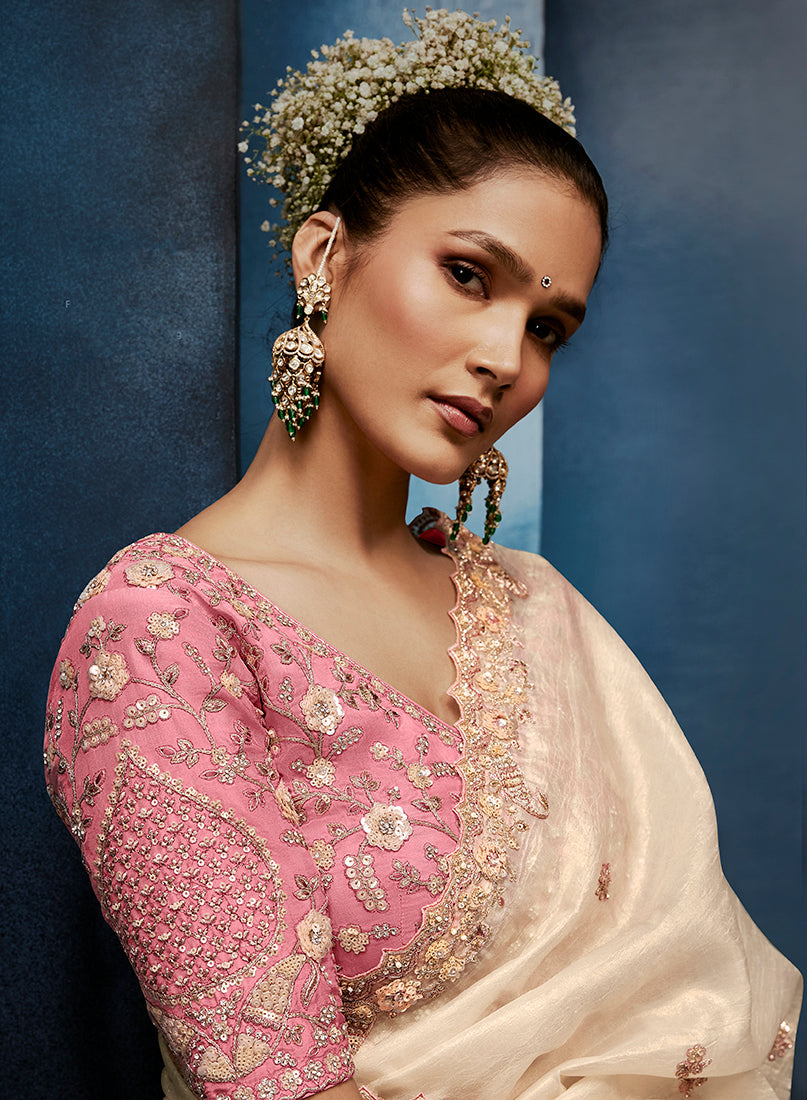 Cream Fancy Fabric Embroidered Saree With Stitched Blouse