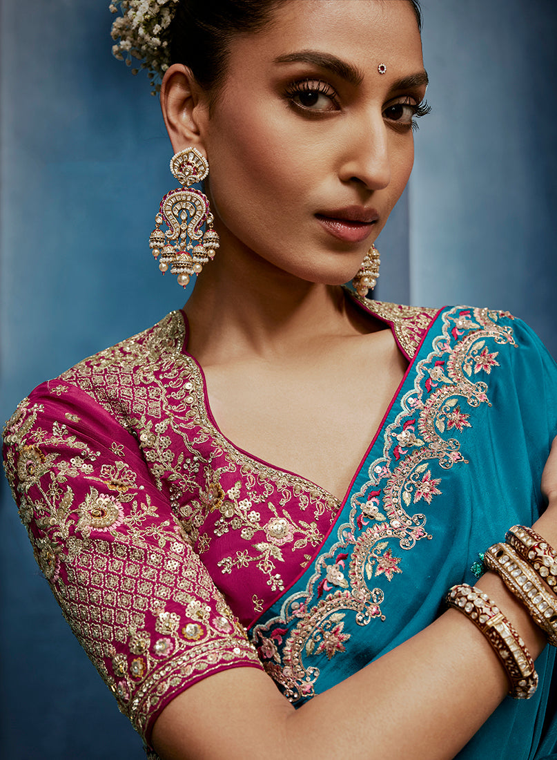 Aqua Blue Fancy Fabric Embroidered Saree with Stitched Blouse