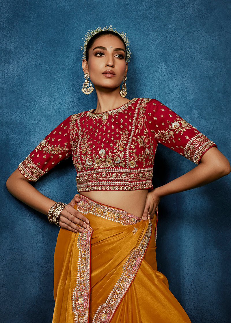 Orange Embroidered Fancy Fabric Saree with Stitched Blouse