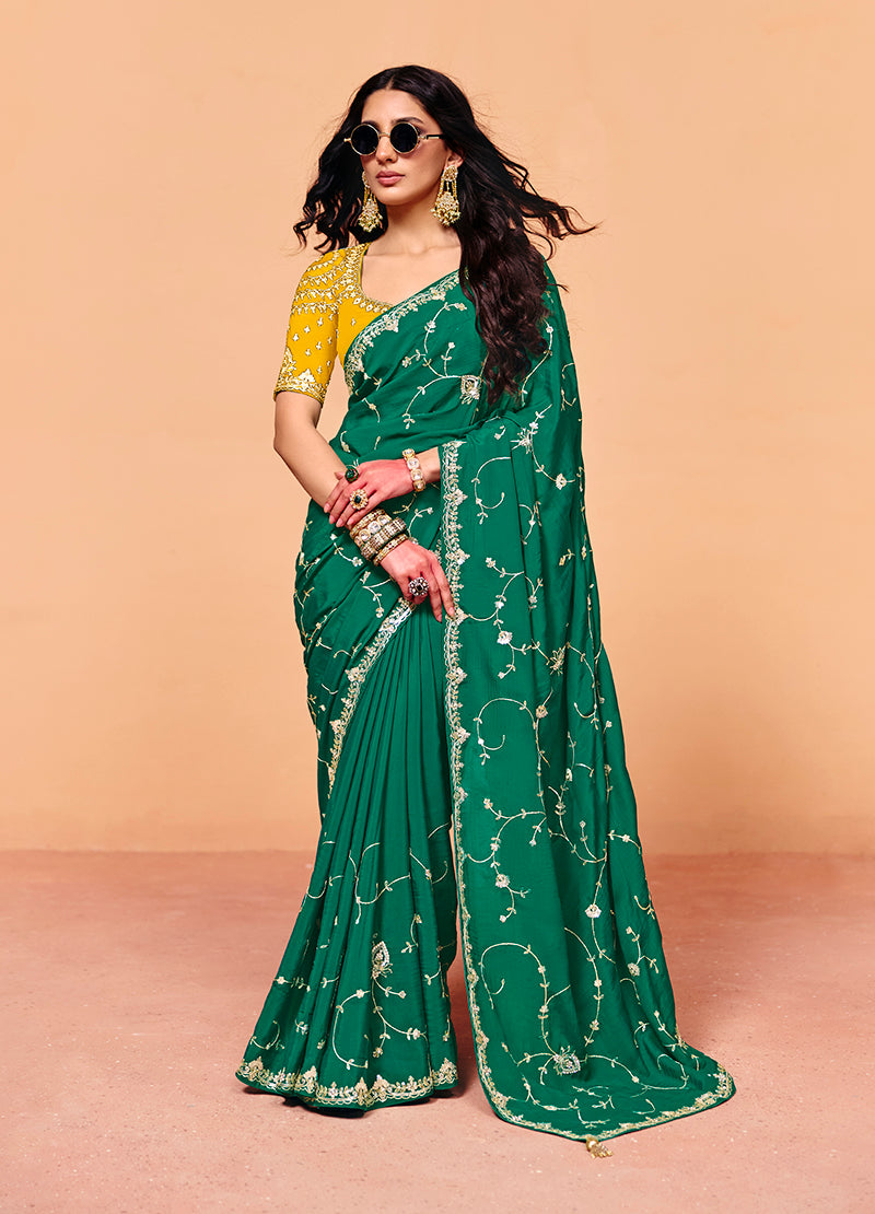Teal green faux organza satin saree with elegant embroidery detail