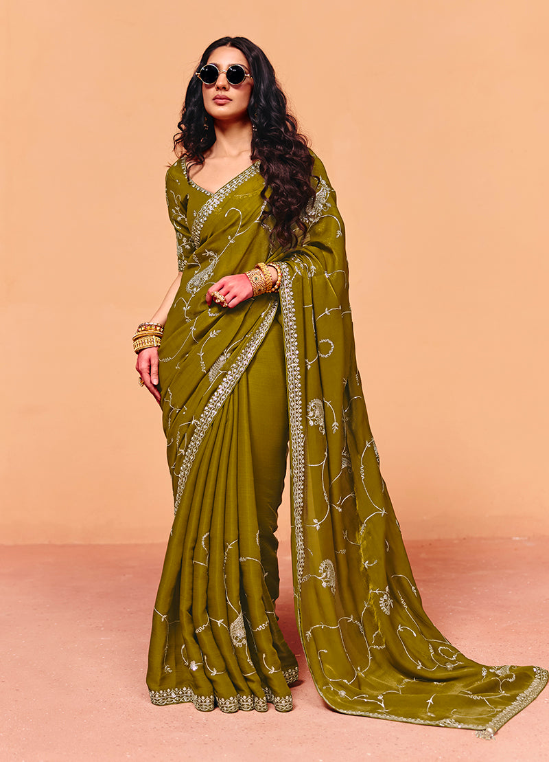 Olive green faux organza satin saree with detailed embroidery border.