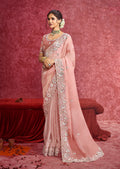 Peach satin silk saree with scalloped lace border and embroidery