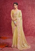 Pastel Yellow Satin Silk saree with gold zari and sequin embroidery