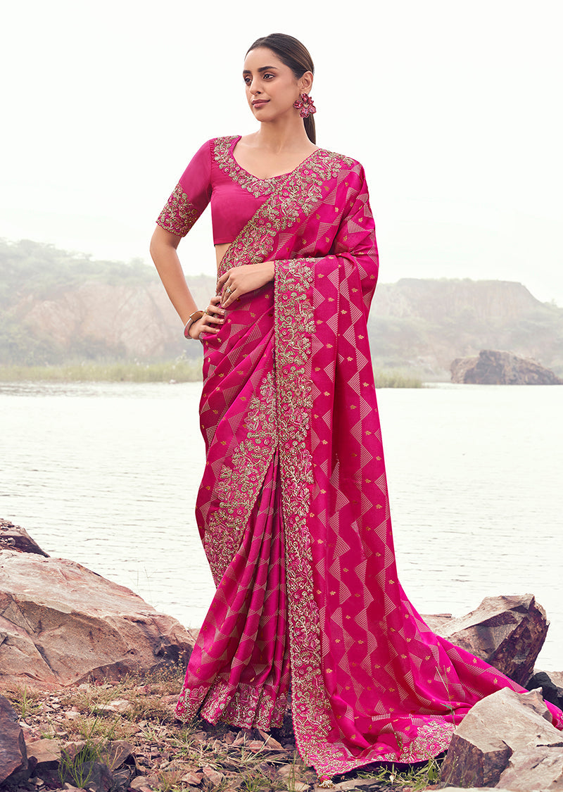 Rani pink satin silk saree with heavy woven embroidery, khatli, and sequins