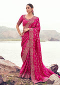 Rani pink satin silk saree with heavy woven embroidery, khatli, and sequins